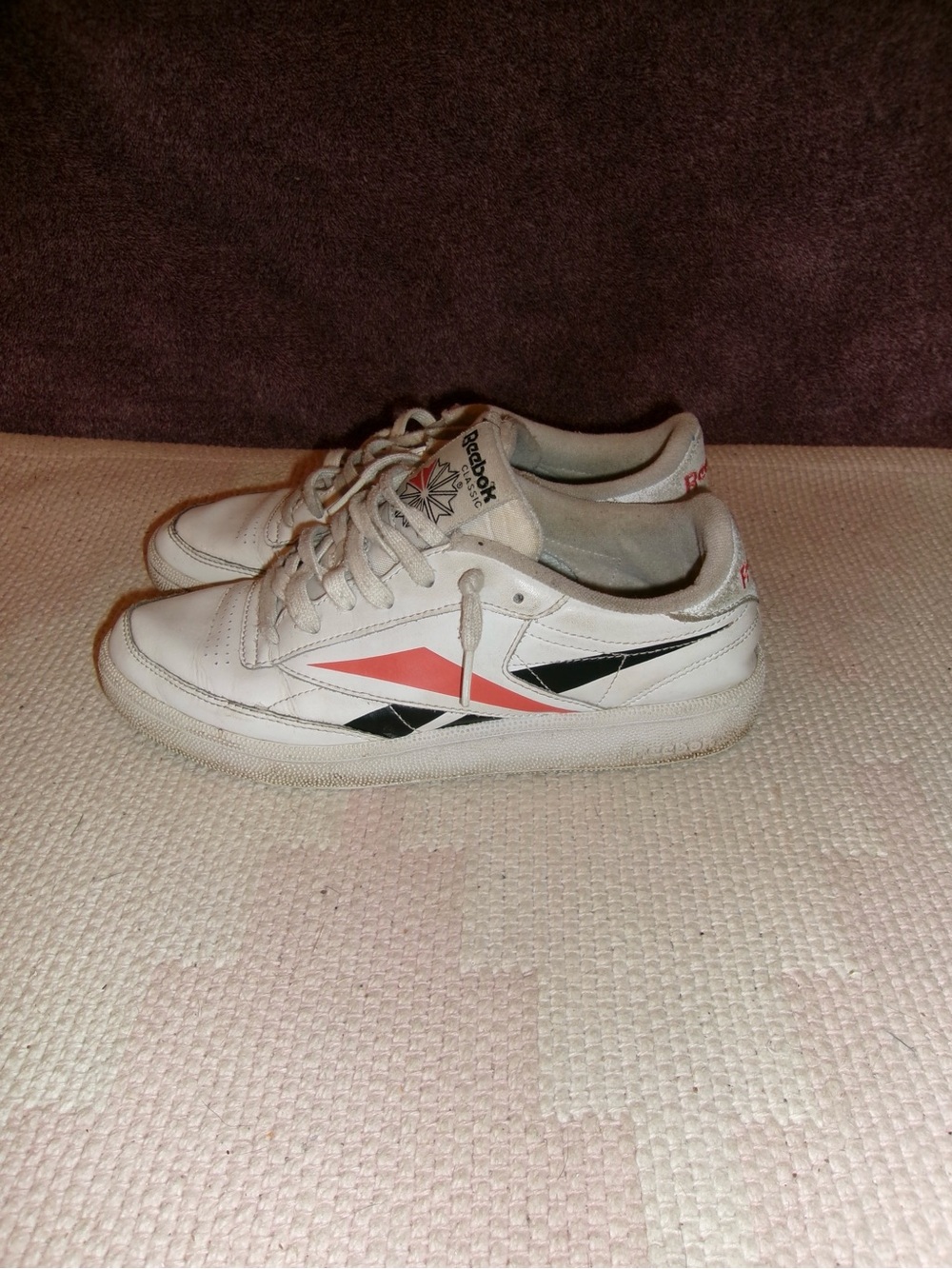 Reebok Women’s White Leather Sneakers with Red and Black Accents